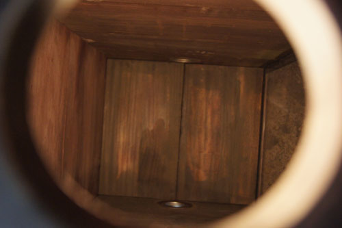 A picture through the stock holes of the Water Torture Cell.